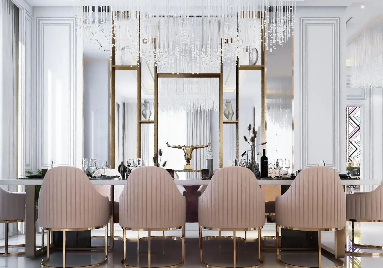 Dining room with blush chairs and a crystal chandelier